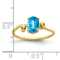 Prsten od žutog zlata od 7 karata s ovalnim plavim kariranim topazom
