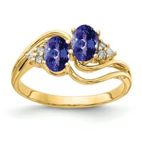 Prsten od žutog zlata od 6 puta s ovalnim Tanzanitom i dijamantom u obliku dijamanta.