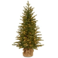 Tvrtka A. M. prethodno je zapalila umjetno mini božićno drvce A. M., zeleno, skandinavska smreka, bijeli vijenci, uključuje podlogu